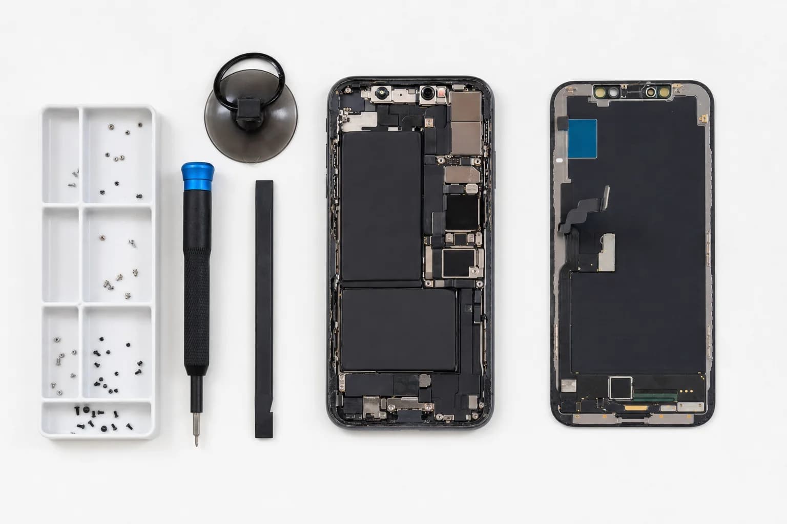 iPhone disassembled on a clean workbench with the internal battery, screen, and repair tools visible, comparing DIY iPhone battery replacement to professional service in Irvine